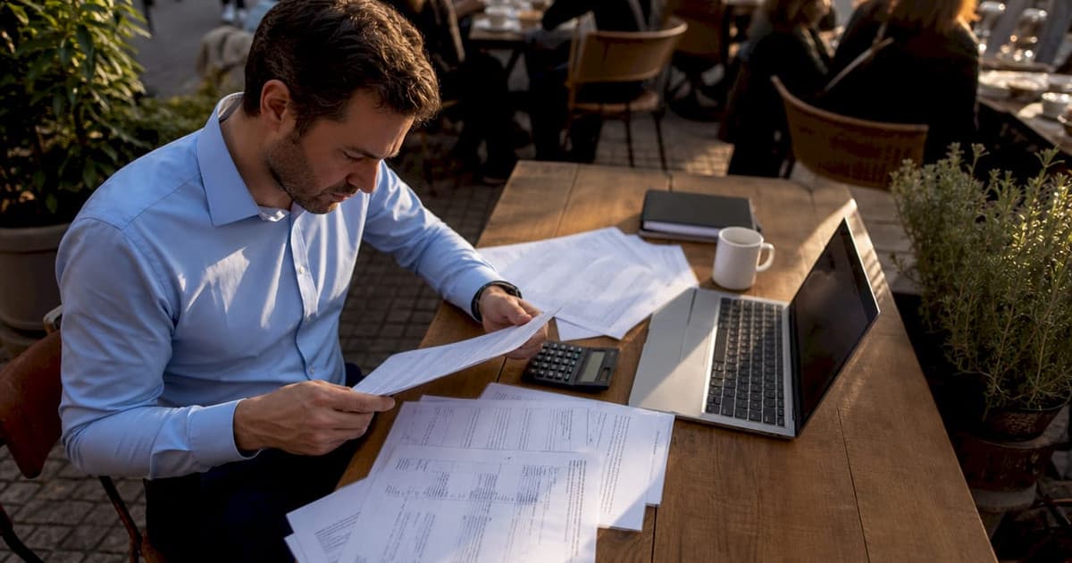Investor reviewing Swiss double taxation documents