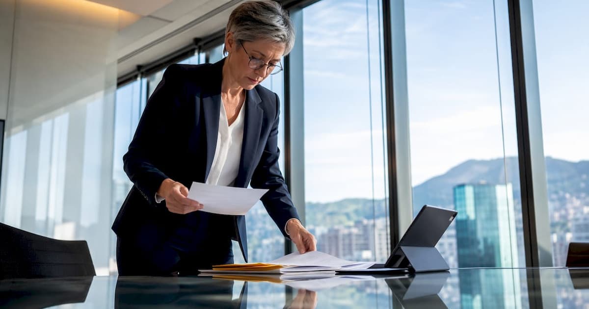 Consultant reviewing Swiss corporate tax documents
